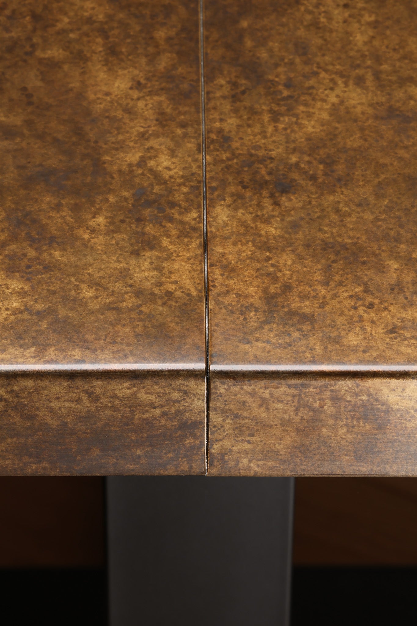 Close-up of a brass surface.