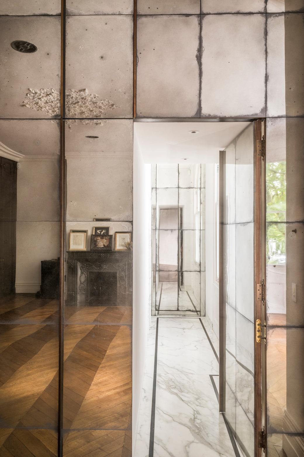 Modern interior with reflective glass walls.
