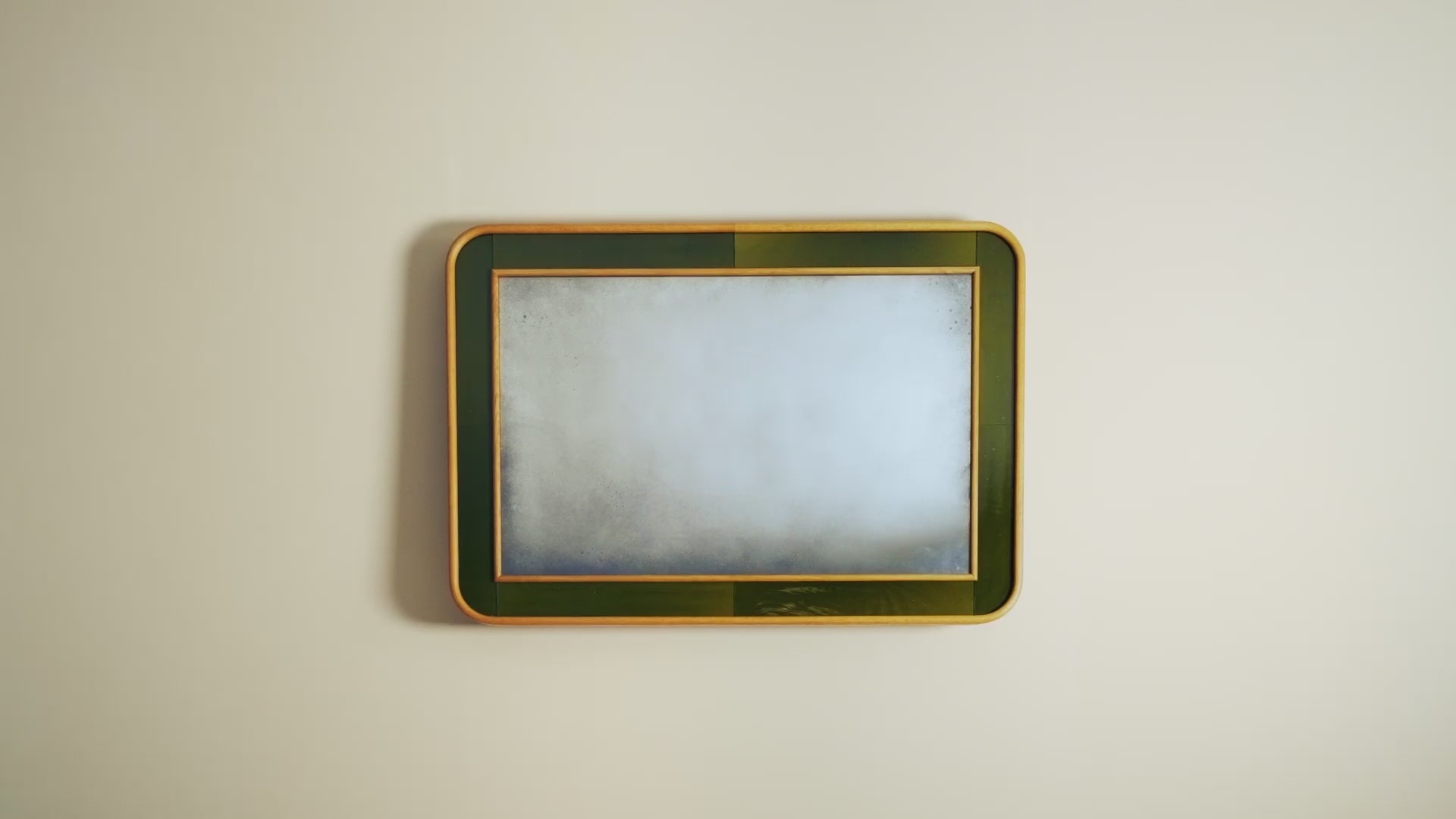 Rectangle mirror on a beige background.